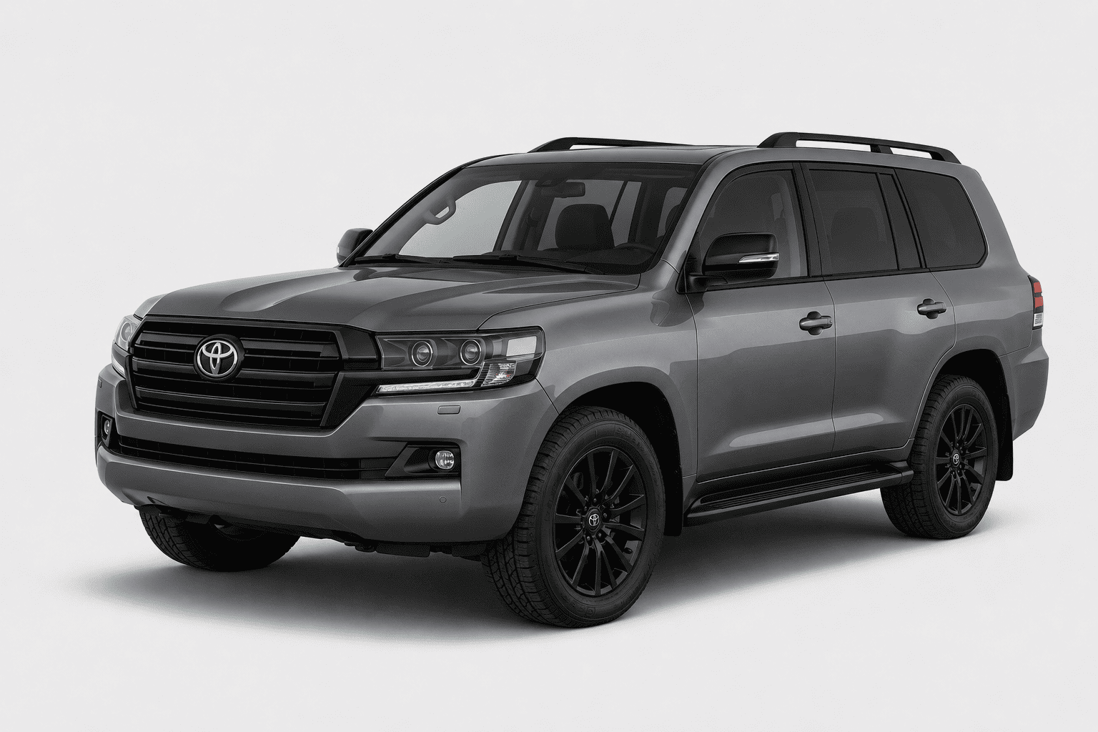A gray Toyota Land Cruiser SUV with black wheels, black roof rails, and a black front grille, shown from a three-quarter front angle on a light gray background.