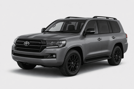A gray Toyota Land Cruiser SUV with black wheels, black roof rails, and a black front grille, shown from a three-quarter front angle on a light gray background.