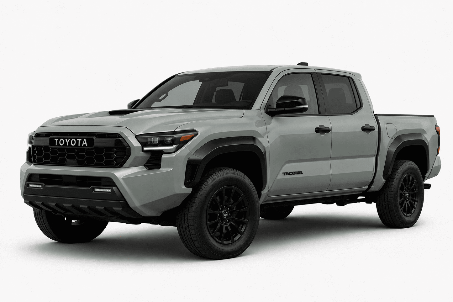 A silver Toyota Tacoma pickup truck shown from a three-quarter front angle on a clean, light gray studio background.