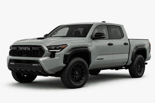 A silver Toyota Tacoma pickup truck shown from a three-quarter front angle on a clean, light gray studio background.