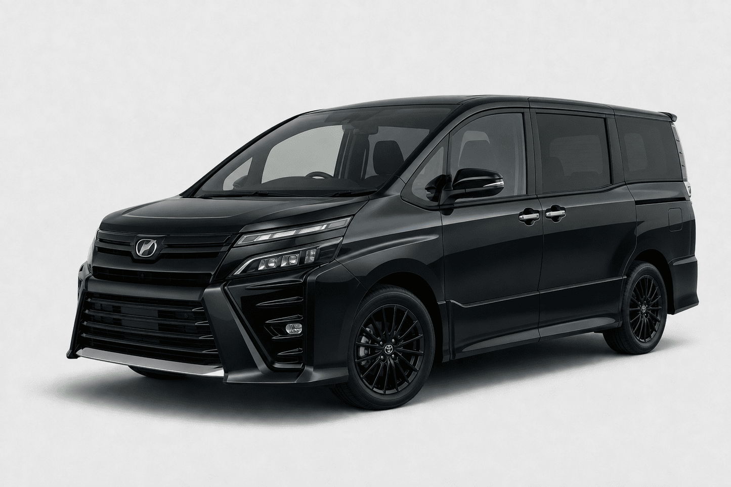 A black luxury minivan with a large front grille, sleek headlights, and black multi-spoke wheels, photographed on a light gray studio background.