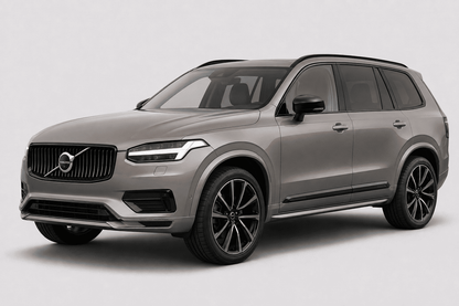 A silver Volvo SUV photographed at a three-quarter front angle on a clean light gray studio background.