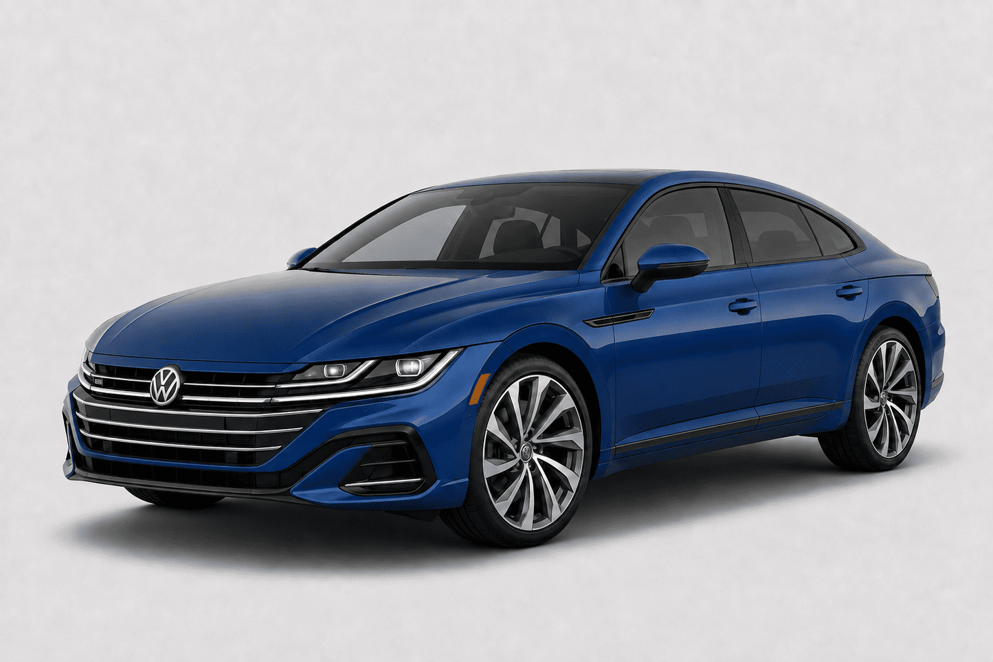 A blue Volkswagen Arteon sedan shown from a three-quarter front angle on a light gray studio background.