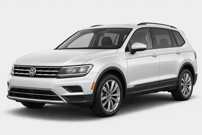 A white Volkswagen SUV photographed in a clean studio setting with a light gray background. The front grille and VW logo are clearly visible, and the vehicle is shown at a three-quarter angle.