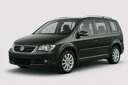 A dark green Volkswagen Touran minivan shown from a three-quarter front angle against a light gray studio background.