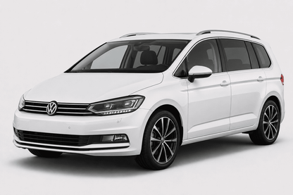 A white Volkswagen Sharan minivan shown from a three-quarter front angle on a light gray studio background.