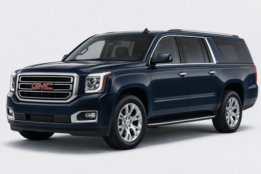 A dark navy blue GMC Yukon XL SUV shown from a three-quarter front angle on a light gray studio background.